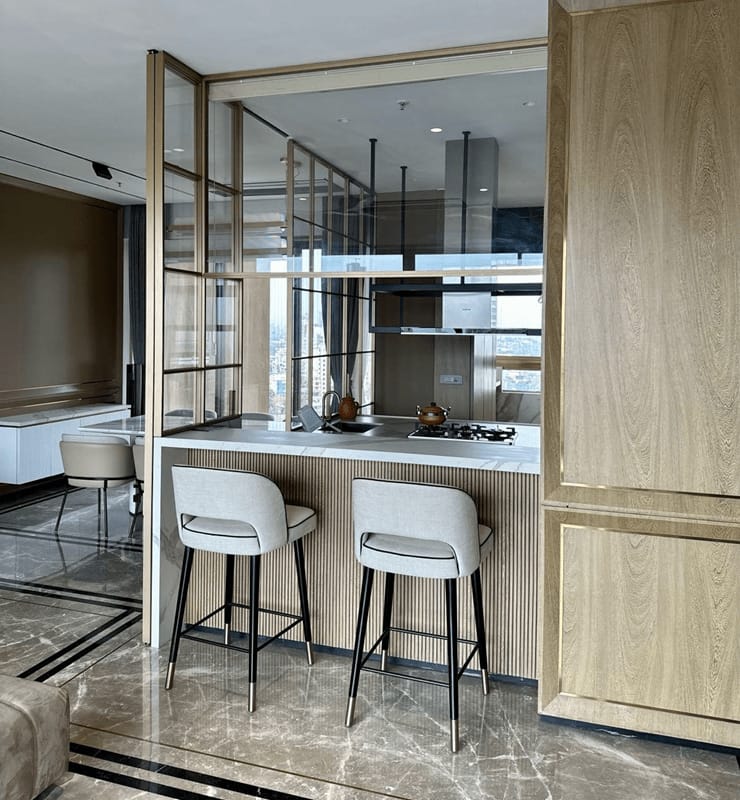 Modern kitchen and dining interior design by Vaarahi Interiors